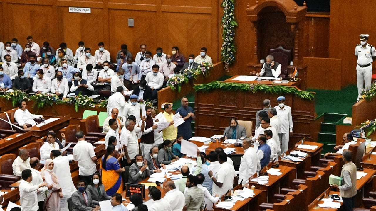 Congress MLAs during the assembly session at Suvarna Soudha. Credit: IANS Photo