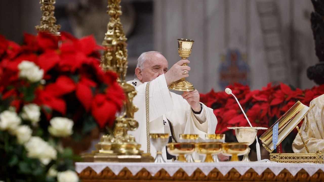 Pope Francis celebrates Christmas Eve Holy Mass in St. Peter's Basilica at the Vatican. Credit: Reuters Photo