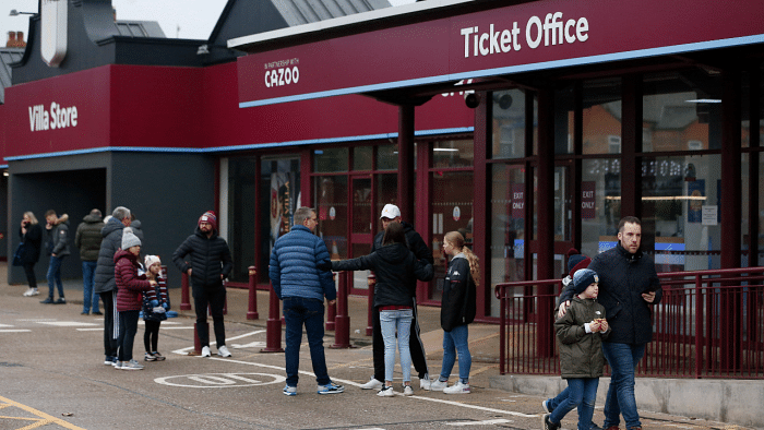 General view of fans outside the stadium before the match was postponed due to Covid-19. Credit: Reuters Photo