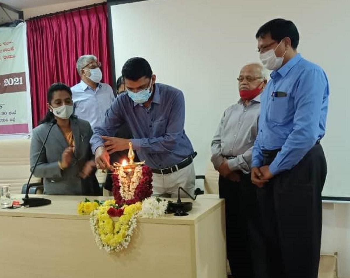 Deputy Commissioner M Kurma Rao inaugurates a consumer’s day programme at ZP hall in Manipal.