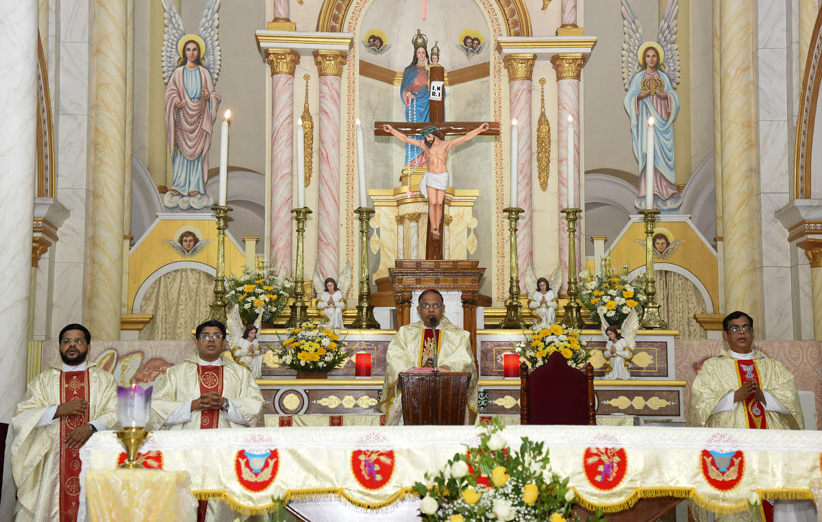 Mangalore Diocese Bishop Rev Peter Paul Saldanha initiates the prayer on account of Christmas at Rosario Church in Mangaluru. DH Photo 