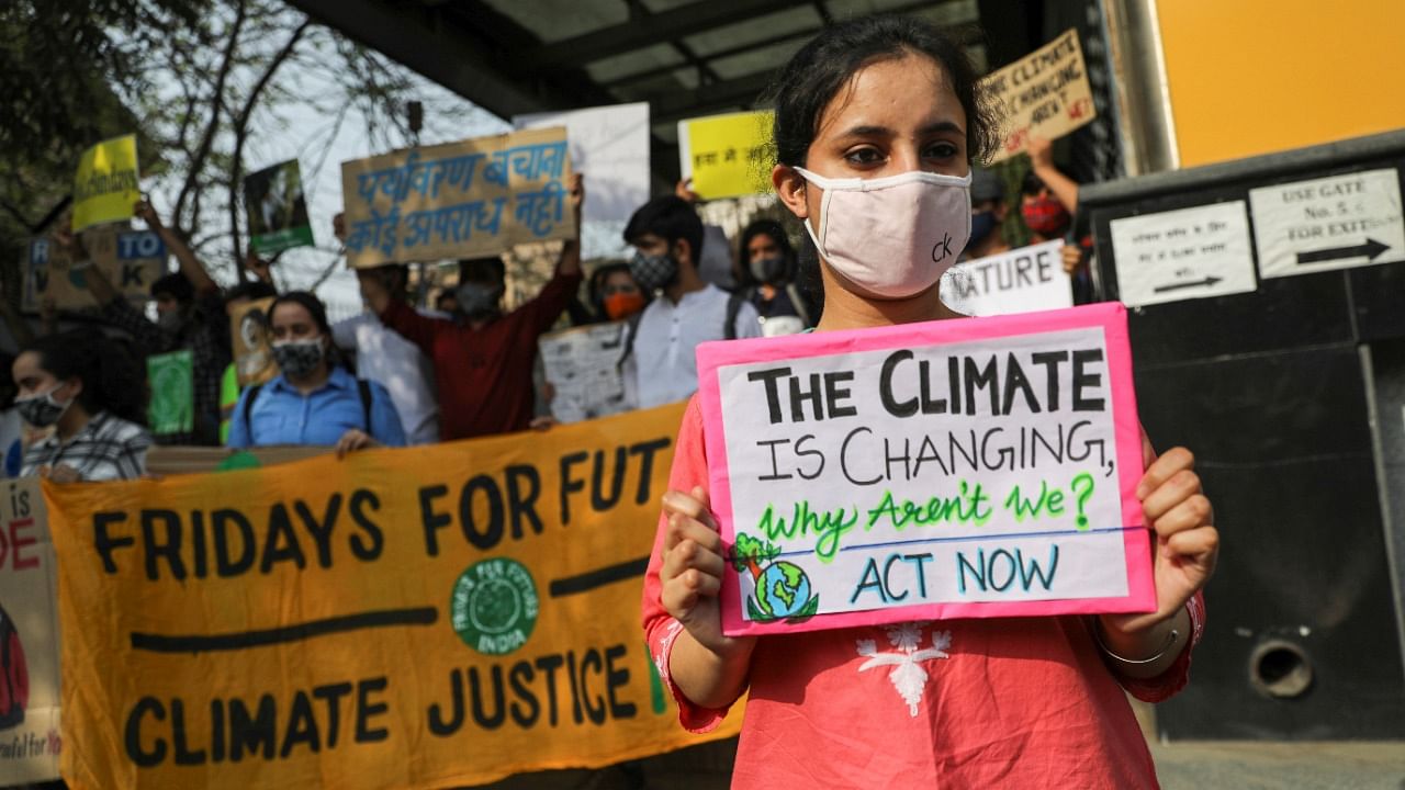 People take part in a 'Fridays for Future' march towards the Delhi Secretariat building, calling for urgent measures to combat climate change, in New Delhi, India, March 19, 2021. Credit: Reuters File Photo