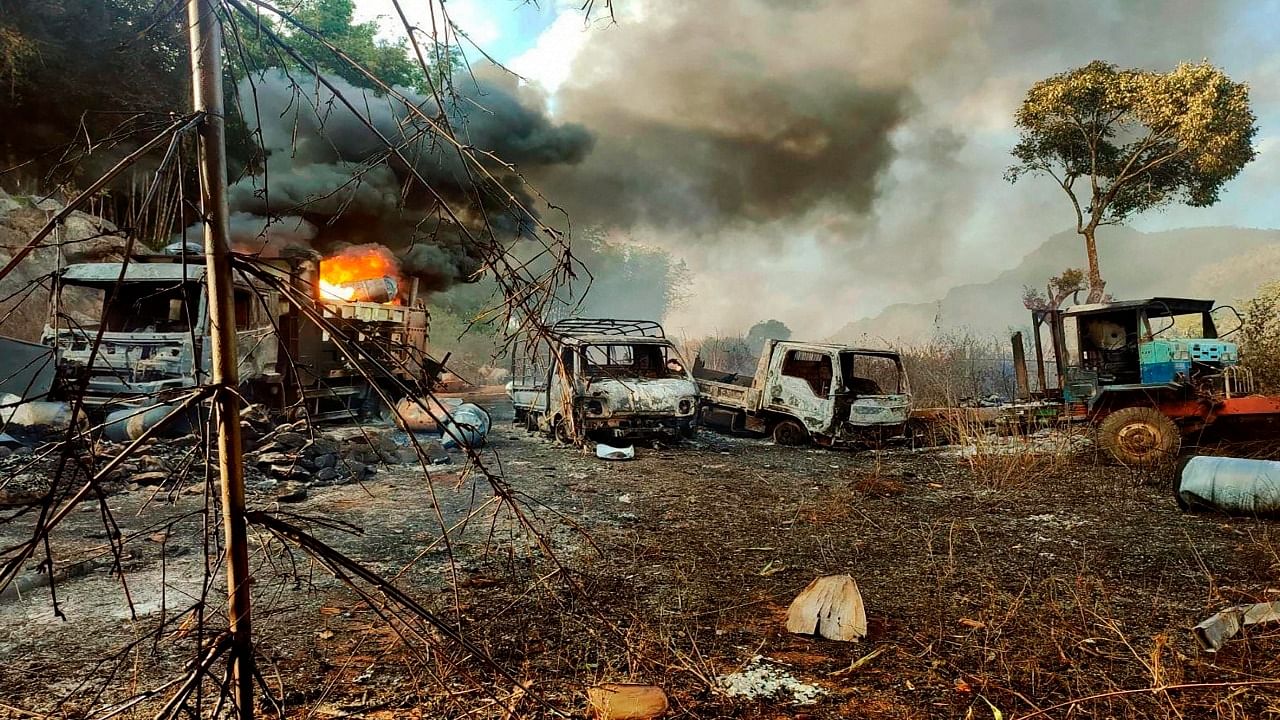 On Saturday, photos appeared on social media purporting to show two burned-out trucks and a car on a highway in Hpruso township in Kayah state. Credit: AP/PTI File Photo