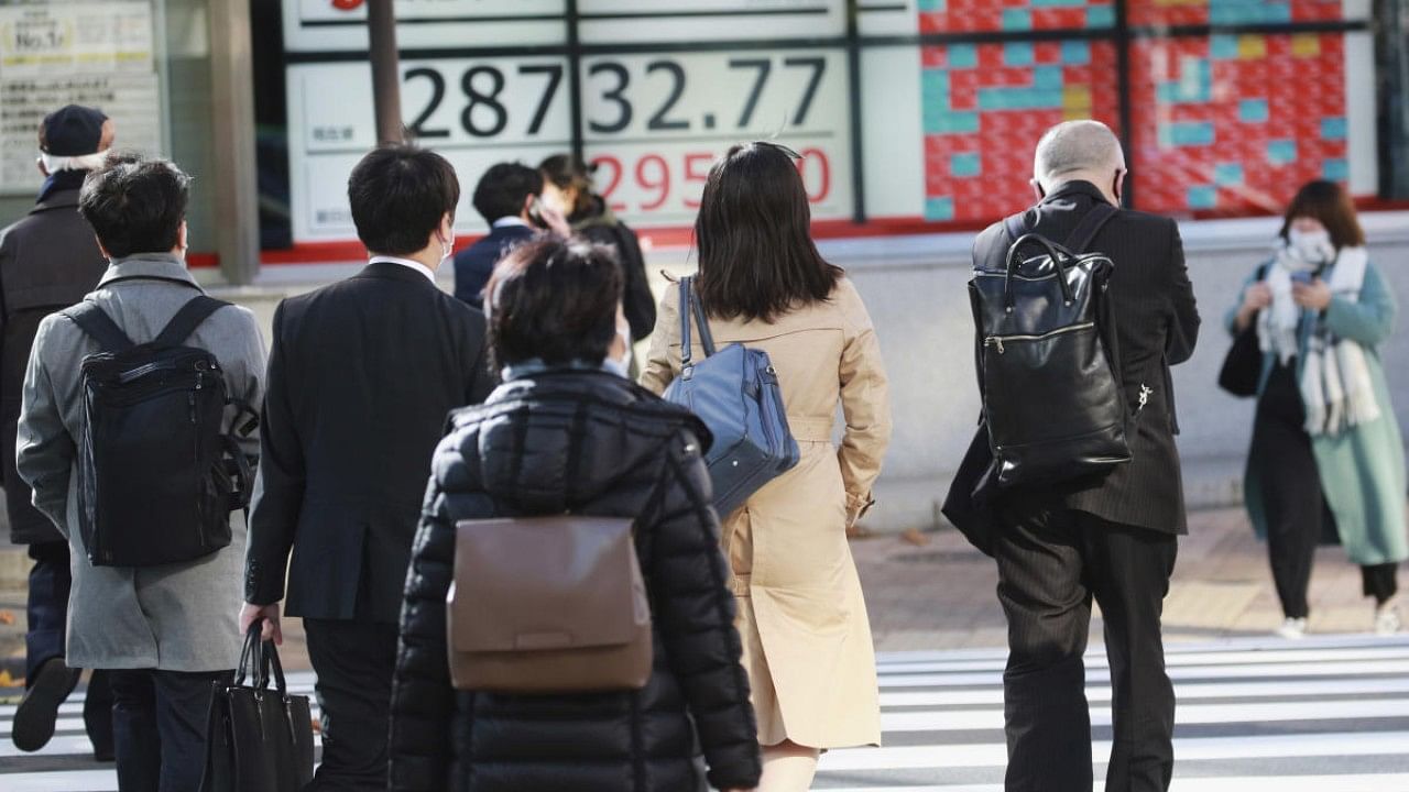 In Asia, China reported its highest daily rise in local Covid-19 cases in 21 months over the weekend as infections more than doubled in the northwestern city of Xian, the country's latest Covid hot spot. Credit: AP Photo