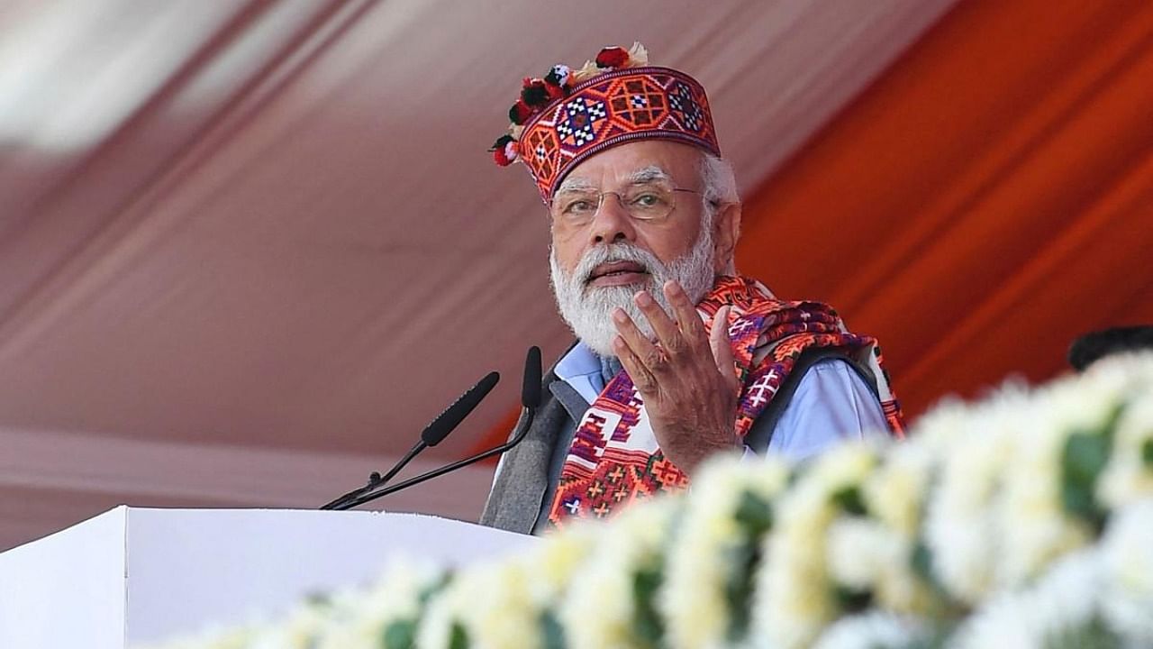 Prime Minister Narendra Modi speaks at the inauguration and foundation stone laying ceremony of multiple projects, in Mandi. Credit: AFP Photo/PIB