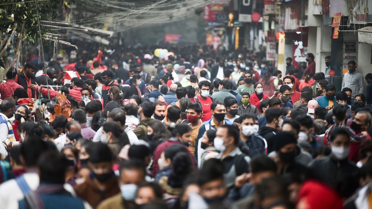 Mask discipline is poor among crowds at Delhi's popular Sarojini market. Credit: PTI Photo