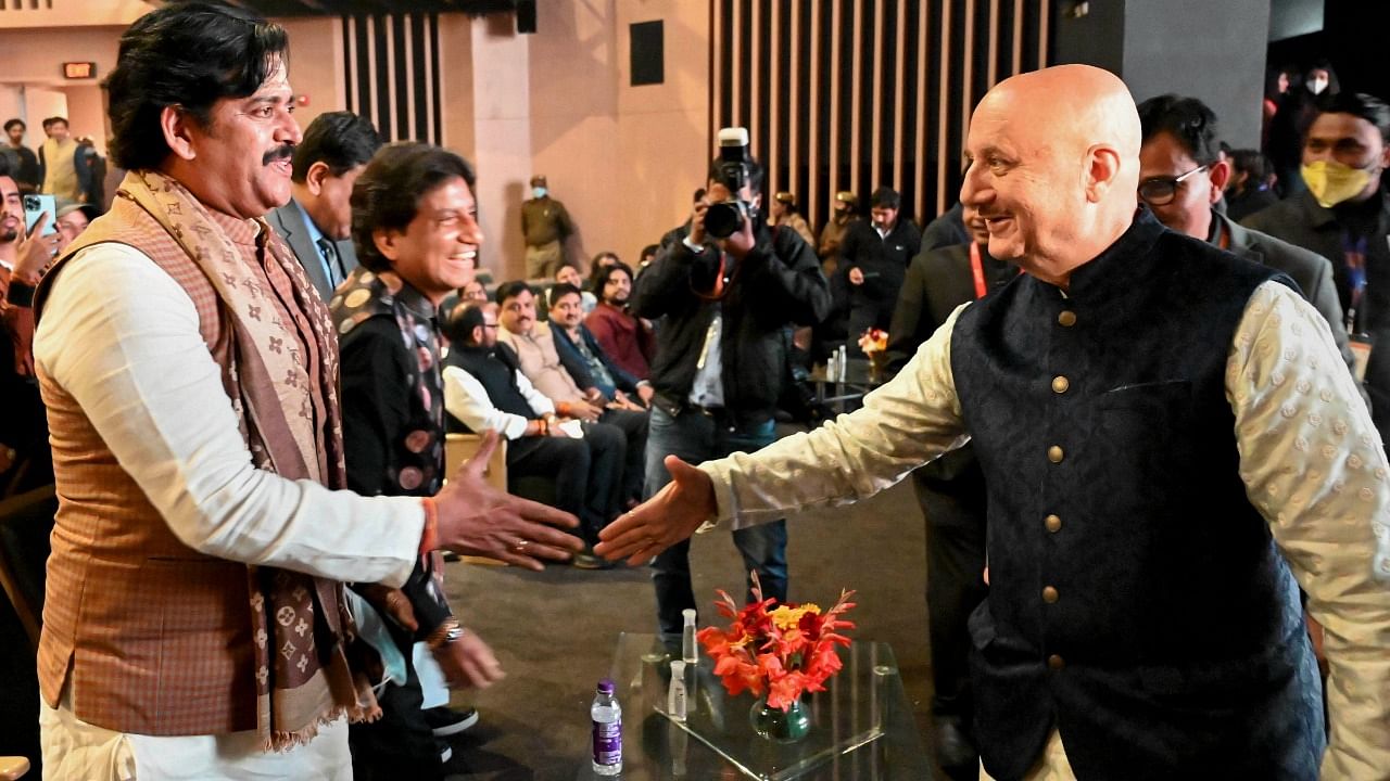 Ravi Kishan (L) with actor Anupam Kher (R) at the launch of the film festival. Credit: PTI Photo