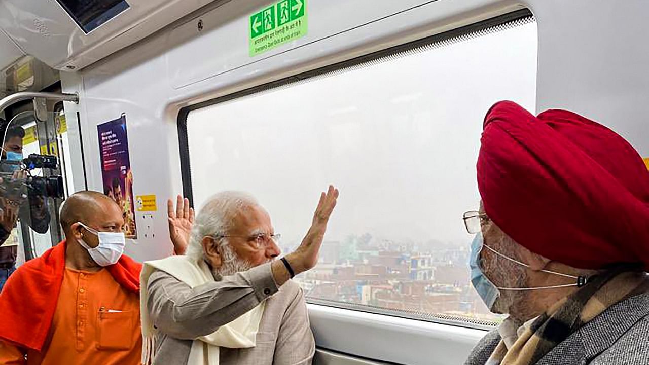 Modi on board the state of the art Kanpur Metro train. Credit: PTI Phot