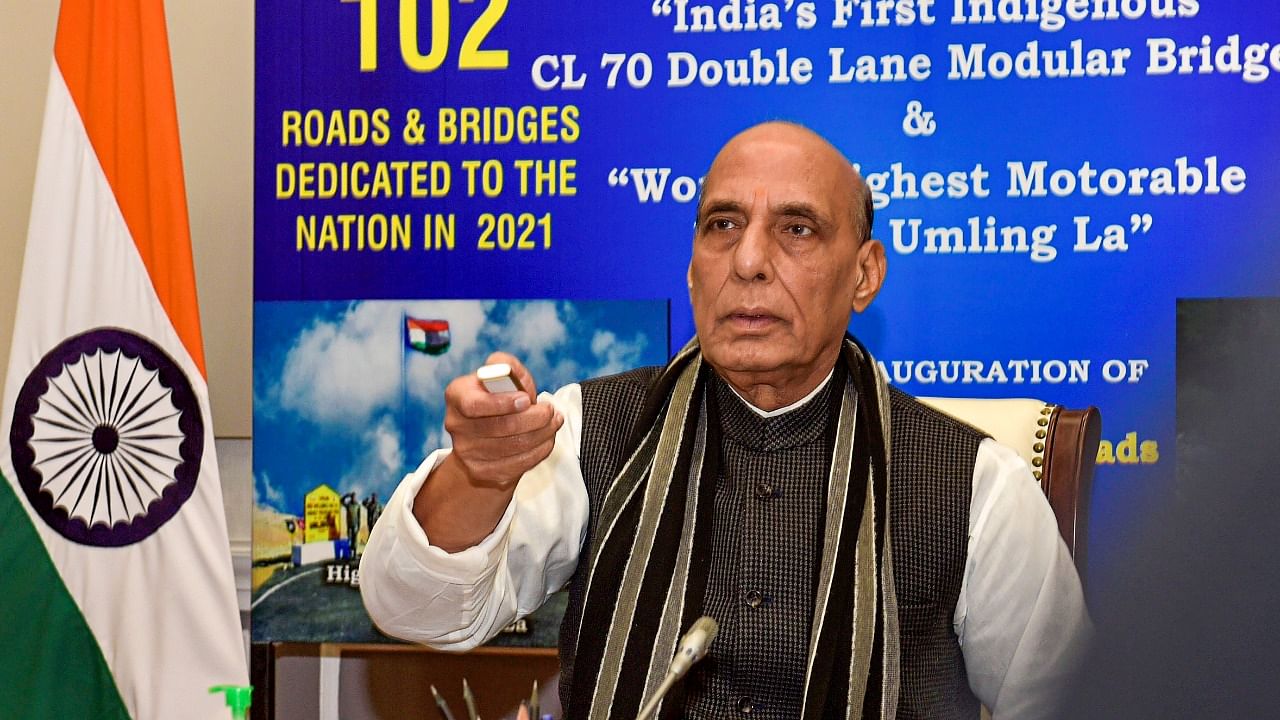 Union Defence Minister Rajnath Singh dedicates to the nation 102 roads and bridges, made by Border Road Organisation, at South Block, New Delhi, Tuesday, December 28, 2021. Credit: PTI Photo