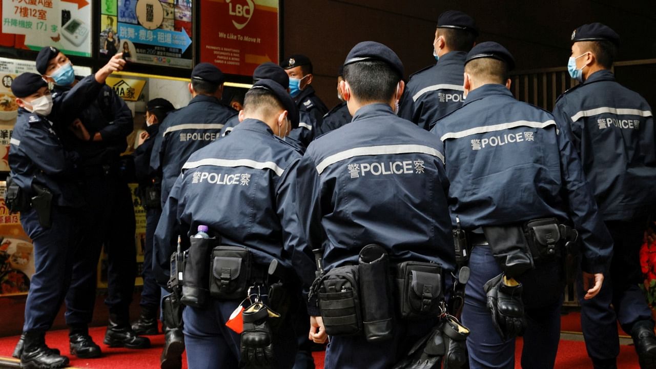 Police in Hong Kong, where Beijing has been ramping up control, on Wednesday burst into the offices of Stand News, seizing phones, computers and documents and taking away its editor-in-chief. Credit: Reuters Photo