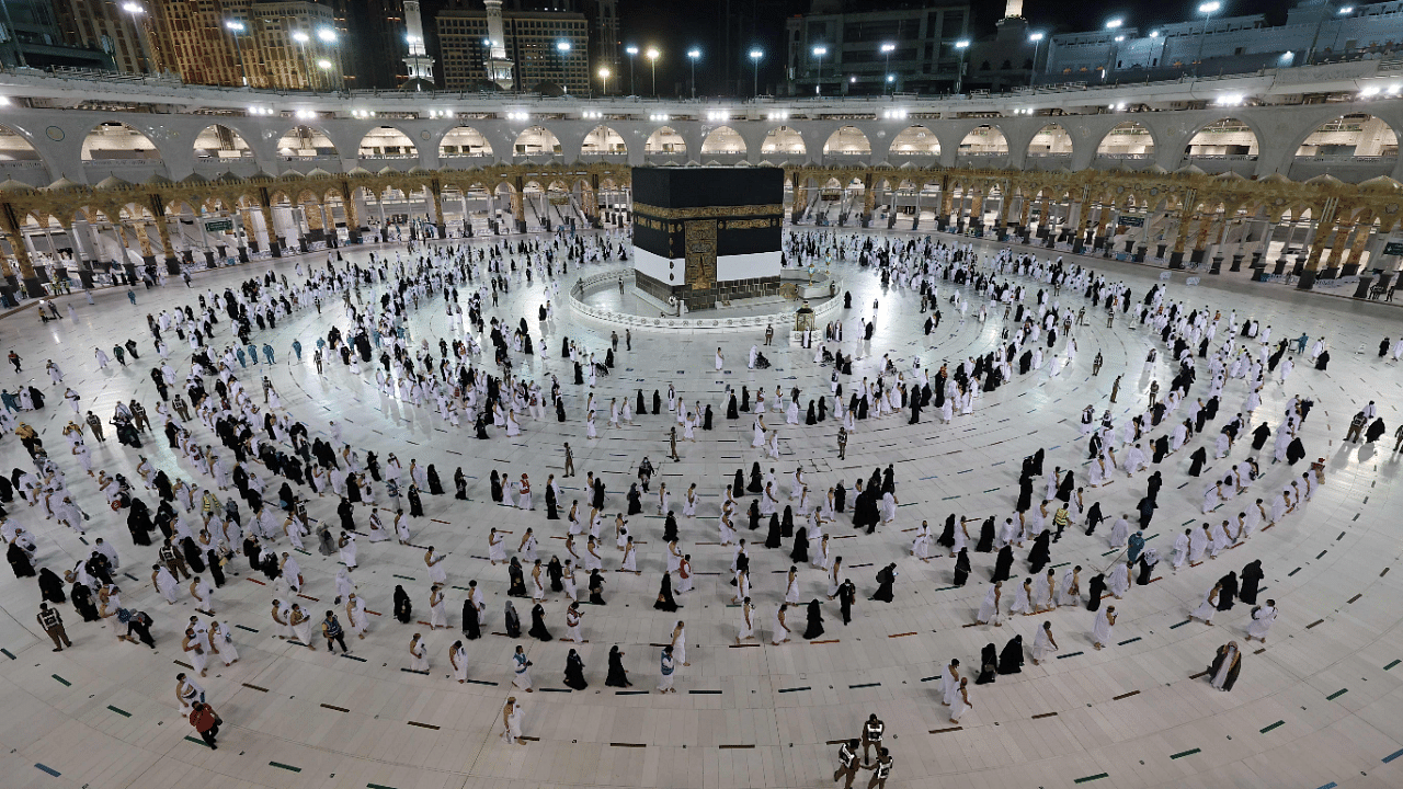 Muslim pilgrims circumambulate around the Kaaba, Islam's holiest shrine, at the Grand mosque in the holy Saudi city of Mecca. Credit: AFP Photo