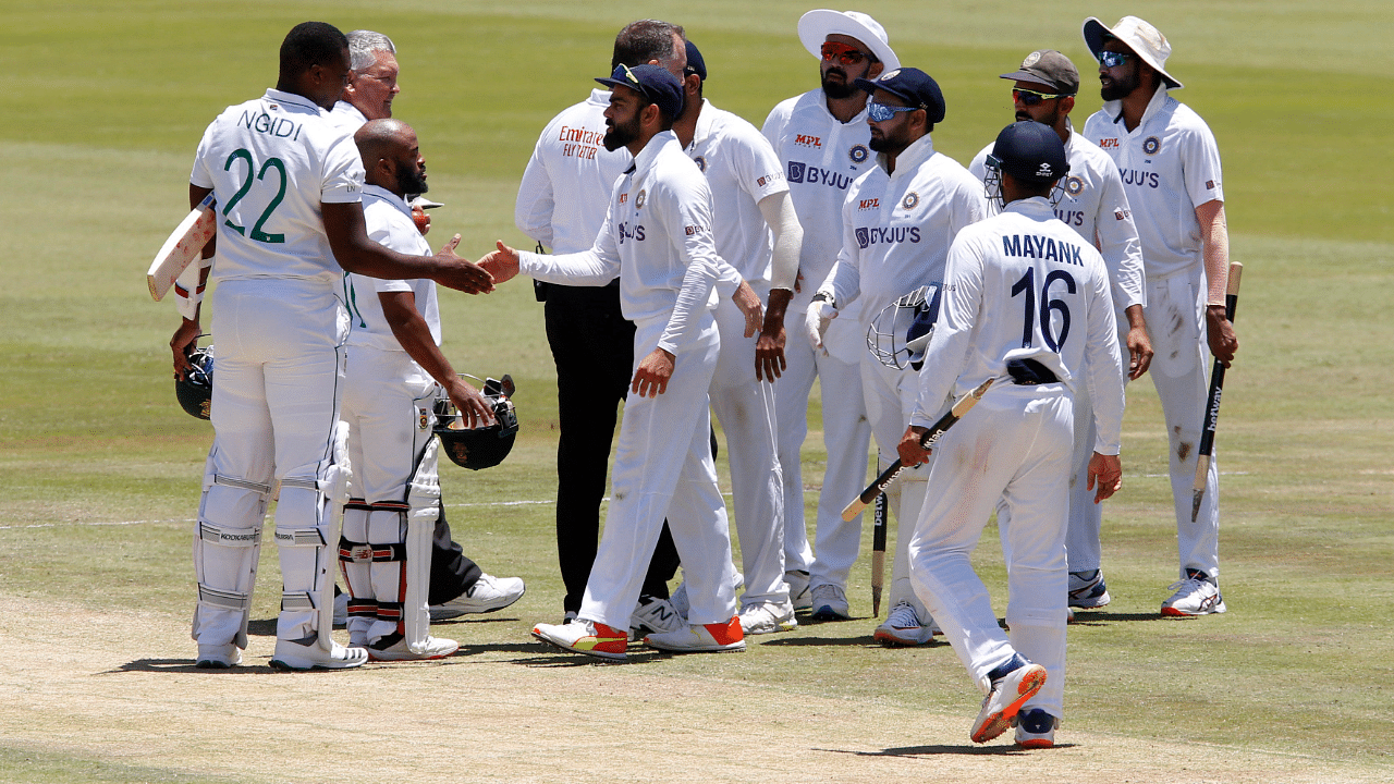India's Virat Kohli shakes hands with South Africa's Lungi Ngidi after winning the match. Credit: Reuters Photo