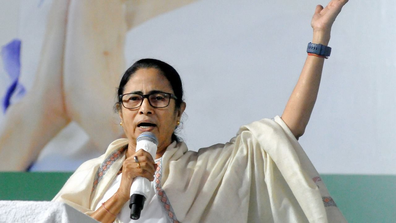 Banerjee said that her government was reviewing the emerging pandemic situation "seriously" and hinted that a decision will be taken regarding restriction. Credit: PTI Photo