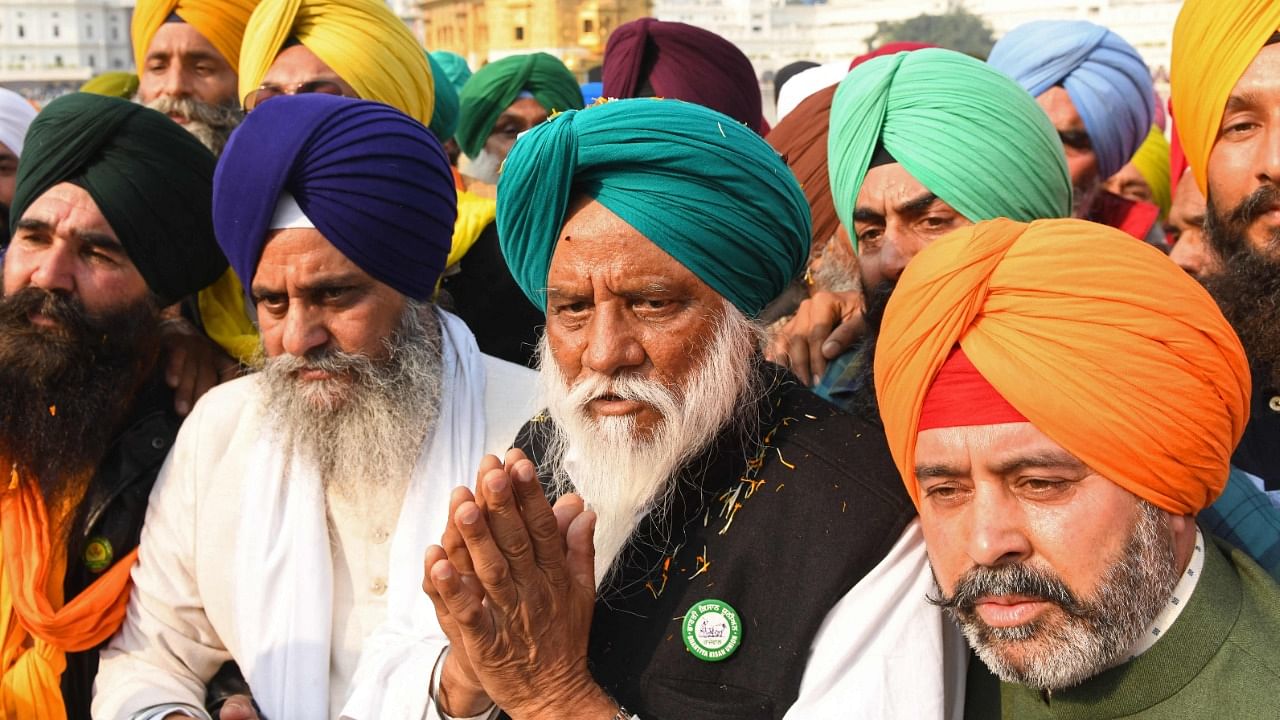 Under the stewardship of Balbir Singh Rajewal (Centre), farmers have decided to form a political front, the Samyukt Samaj Morcha. Credit: AFP Photo