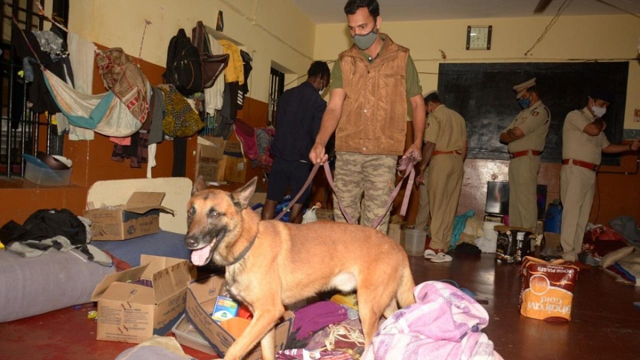 Illicit drugs are regularly found during police raids on prison cells. This picture is of a raid in the Central Prison at Parappana Agrahara in November 2021. Credit: DH File Photo