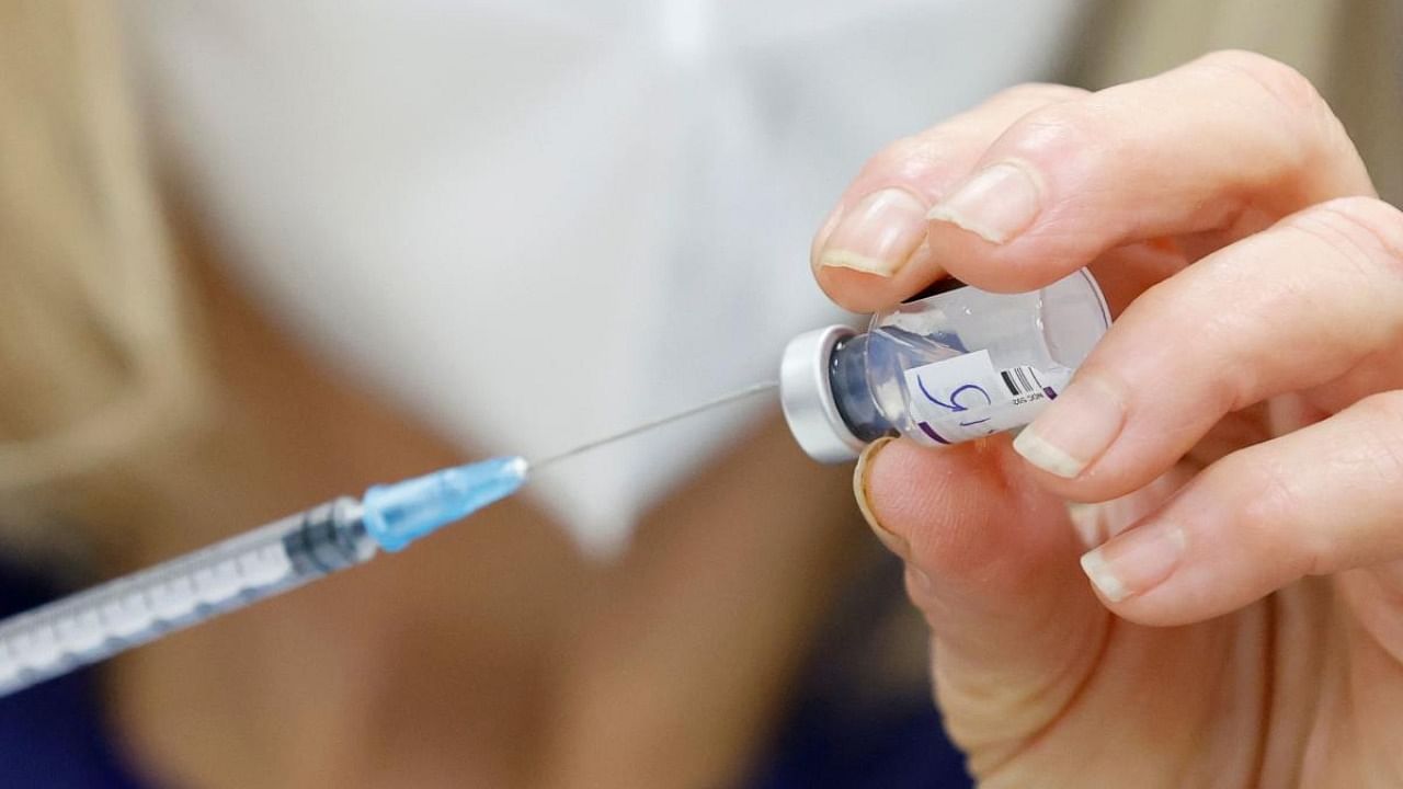 An Israeli nurse prepares a dose of the Pfizer-BioNTech Covid-19 coronavirus vaccine at the Sheba Medical Center in Ramat Gan near Tel Aviv. Credit: AFP Photo