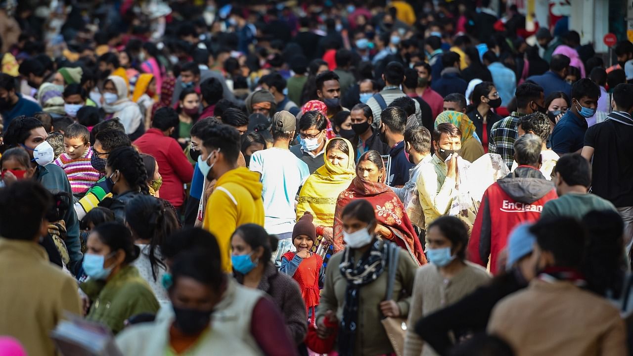 Crowding and violation of Covid-19 norms at the Sarojini Market in Delhi. Credit: PTI Photo