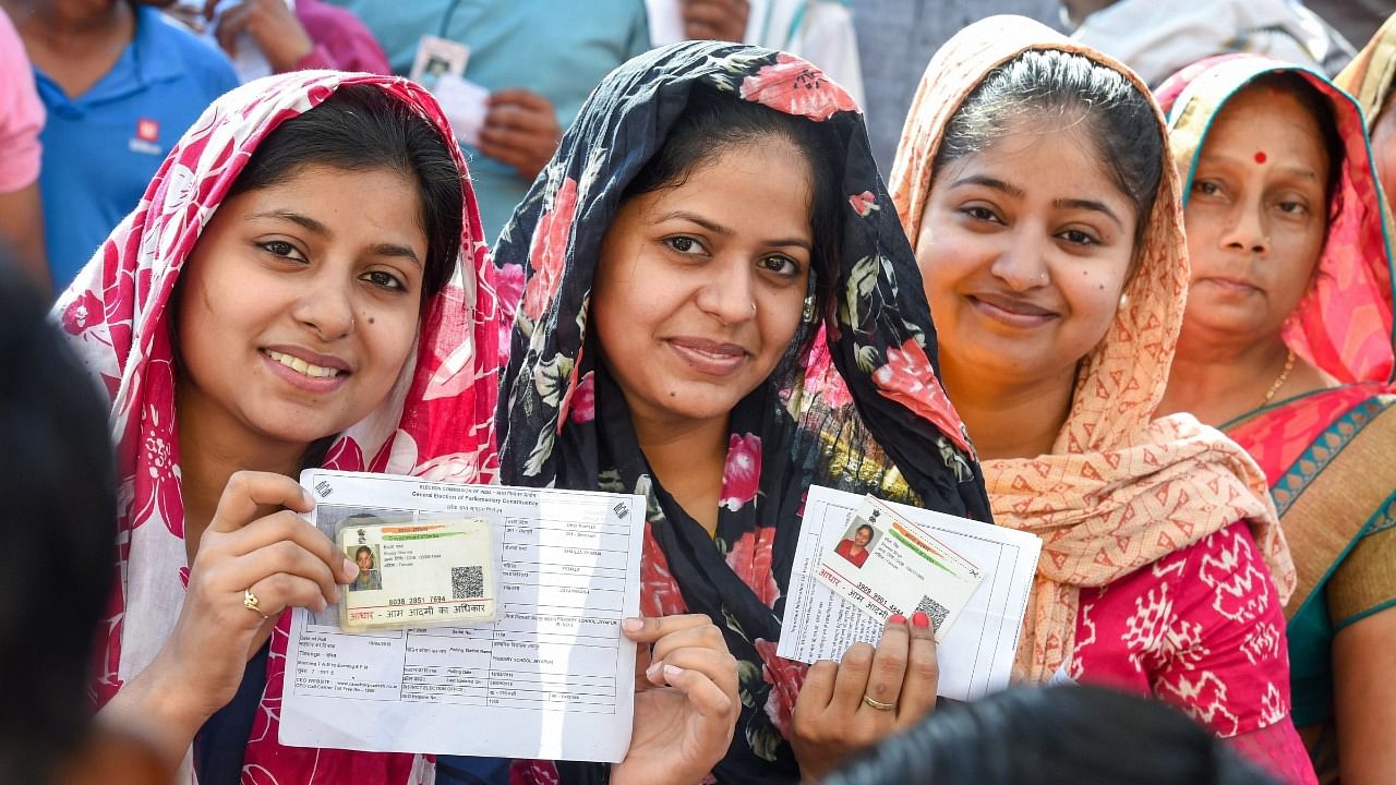 Voters display their credentials ahead of the 2019 polls. Credit: PTI File Photo
