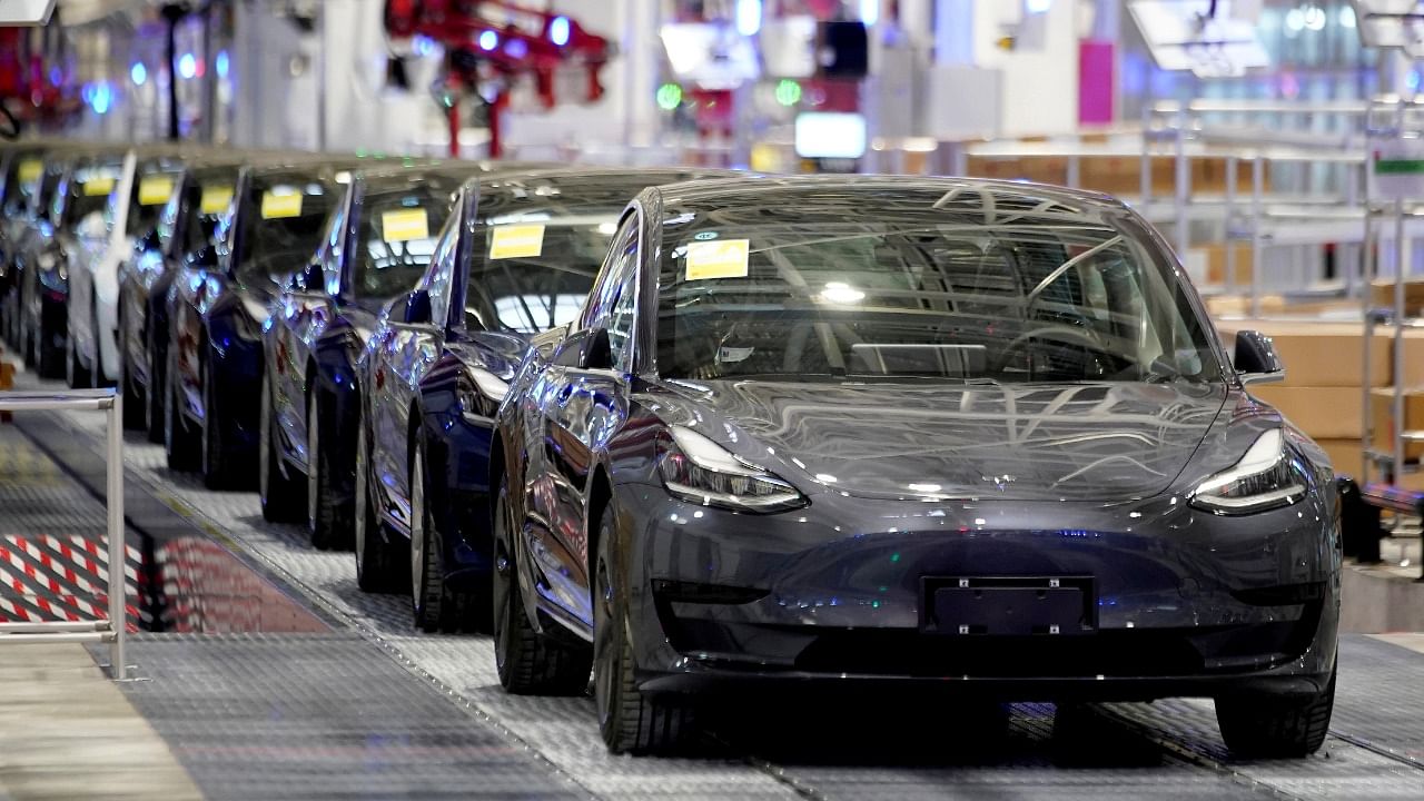 Tesla China-made Model 3 vehicles are seen during a delivery event at its factory in Shanghai, China. Credit: Reuters File Photo