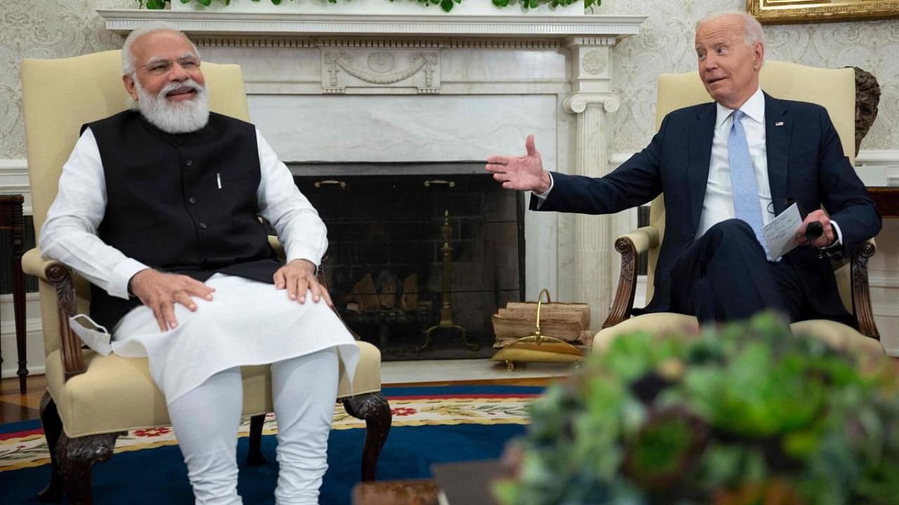 PM Narendra Modi meets with US President Joe Biden. Credit: AFP Photo