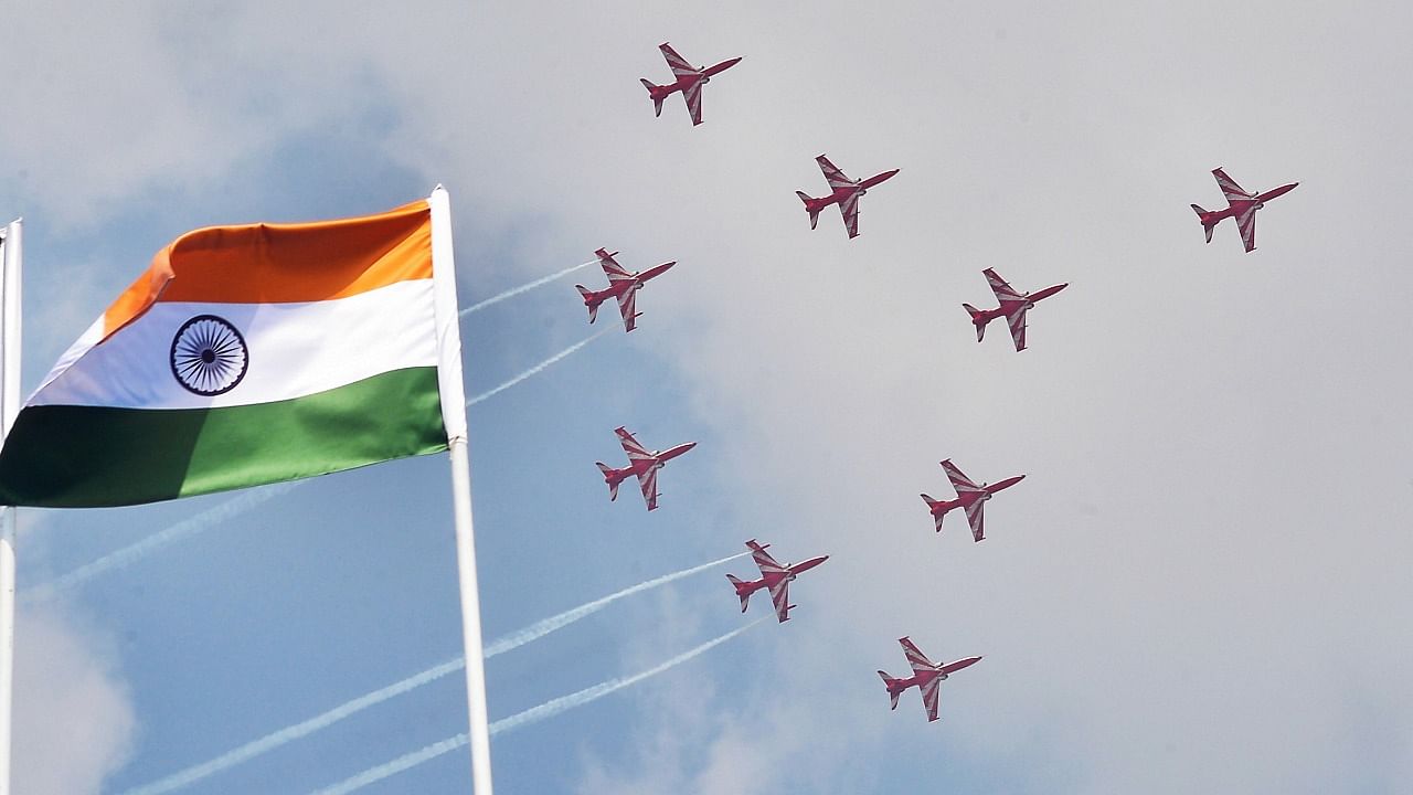 Indian Air Force's aerobatic team 'Suryakiran' performs during the inauguration of the 13th edition of Aero India, at Yelahanka air base in Bengaluru, Wednesday, February 3, 2021. Credit: PTI File Photo