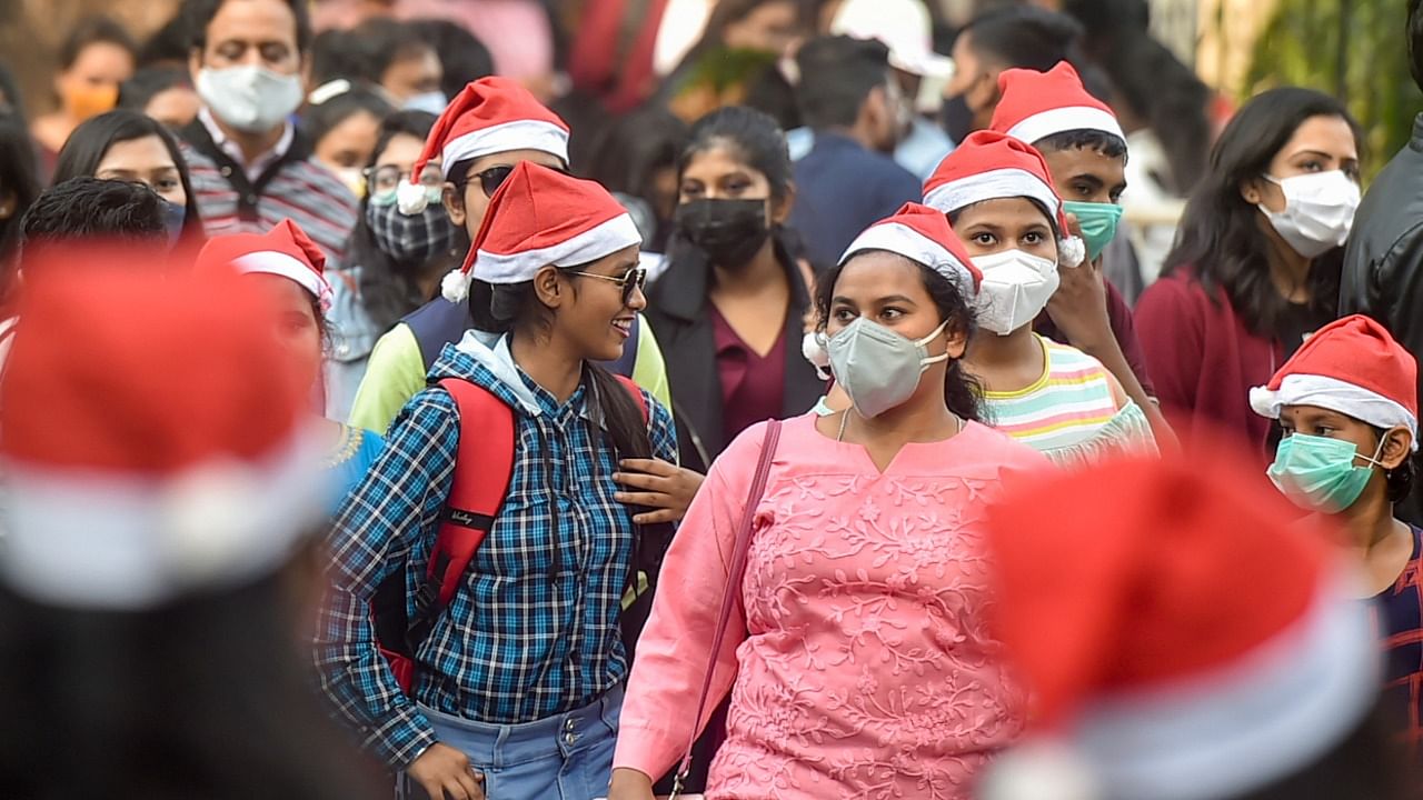 People seen wearing red caps on the occasion of Christmas. Credit: PTI Photo