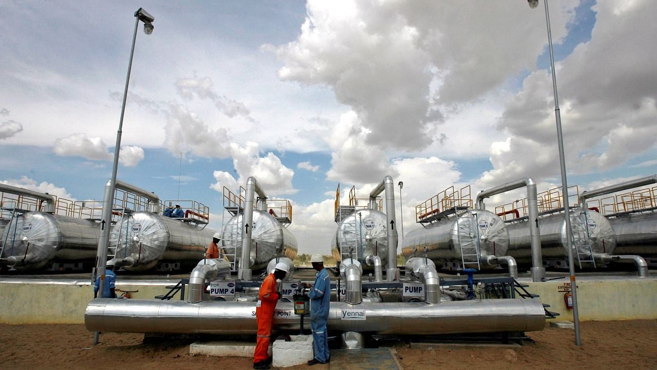 Cairn India employees work at a storage facility for crude oil at Mangala oil field at Barmer. Credit: Reuters File Photo