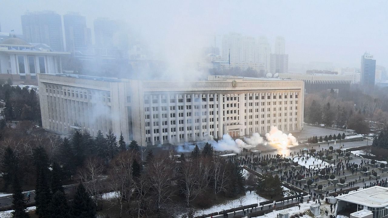 News outlets in Kazakhstan are reporting that demonstrators protesting rising fuel prices broke into the mayor's office in the country's largest city and flames were seen coming from inside. Credit: AP/PTI Photo