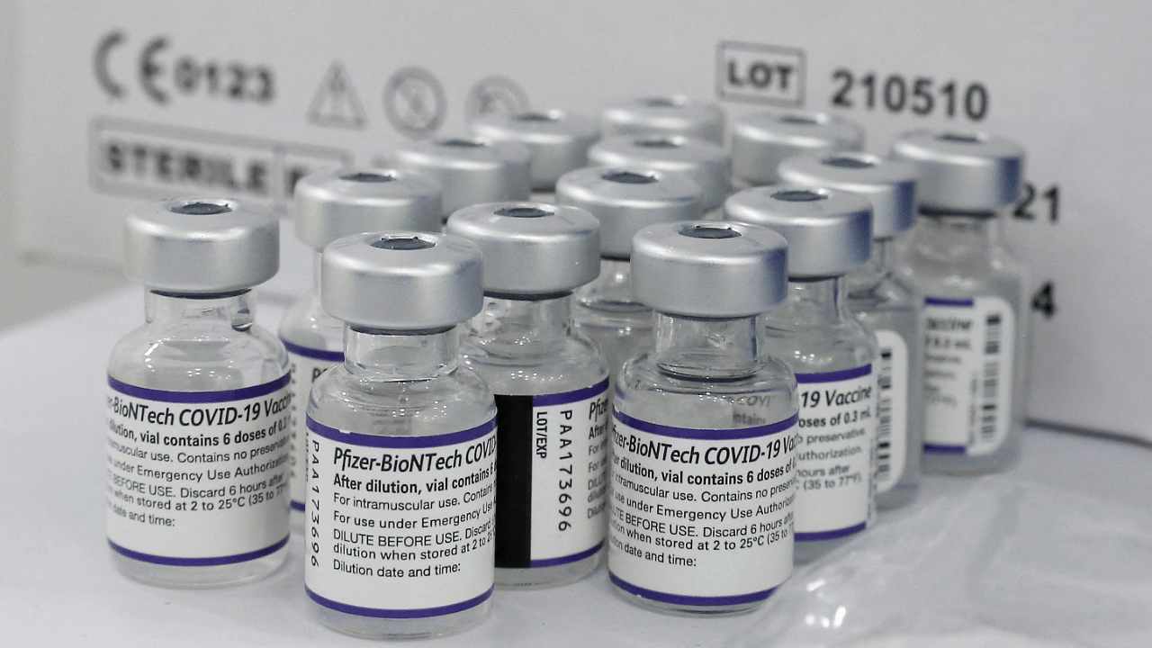 Vials containing the Pfizer/BioNtech vaccine against Covid-19 are displayed at a mobile vaccine clinic. Credit: Reuters Photo