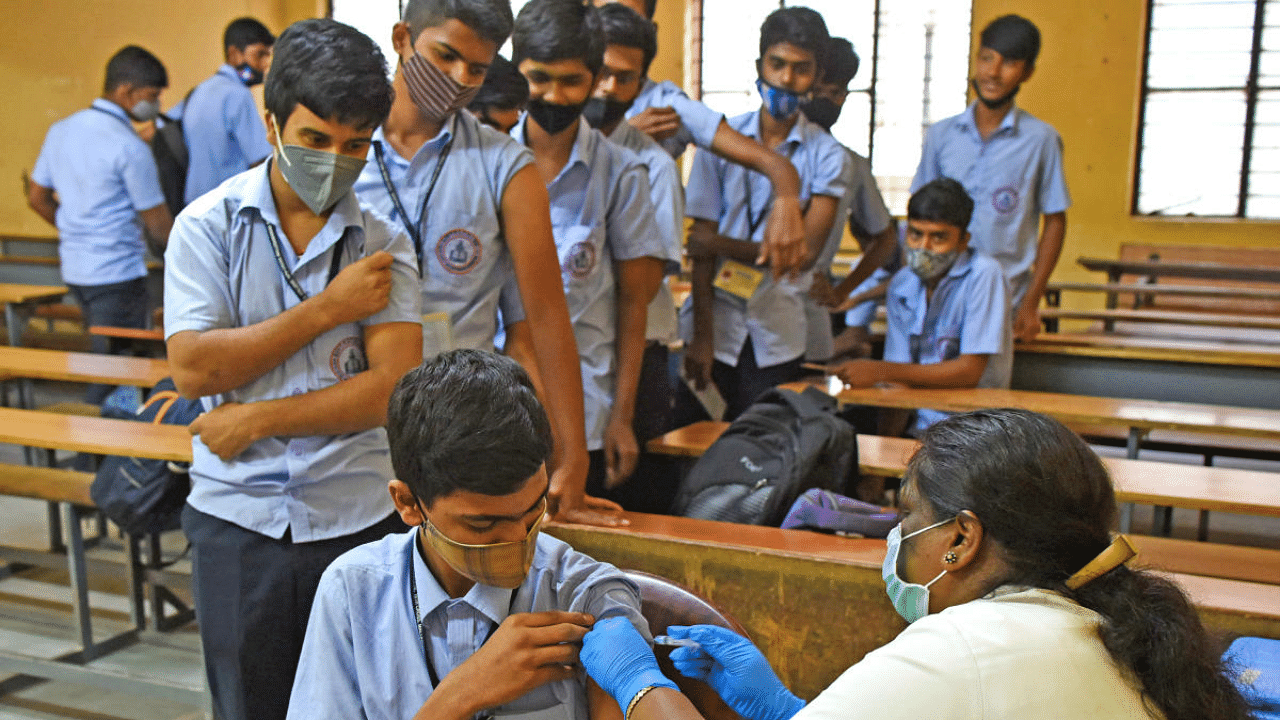 PUC students receive Covid vaccine in Bengaluru. Credit: DH Photo