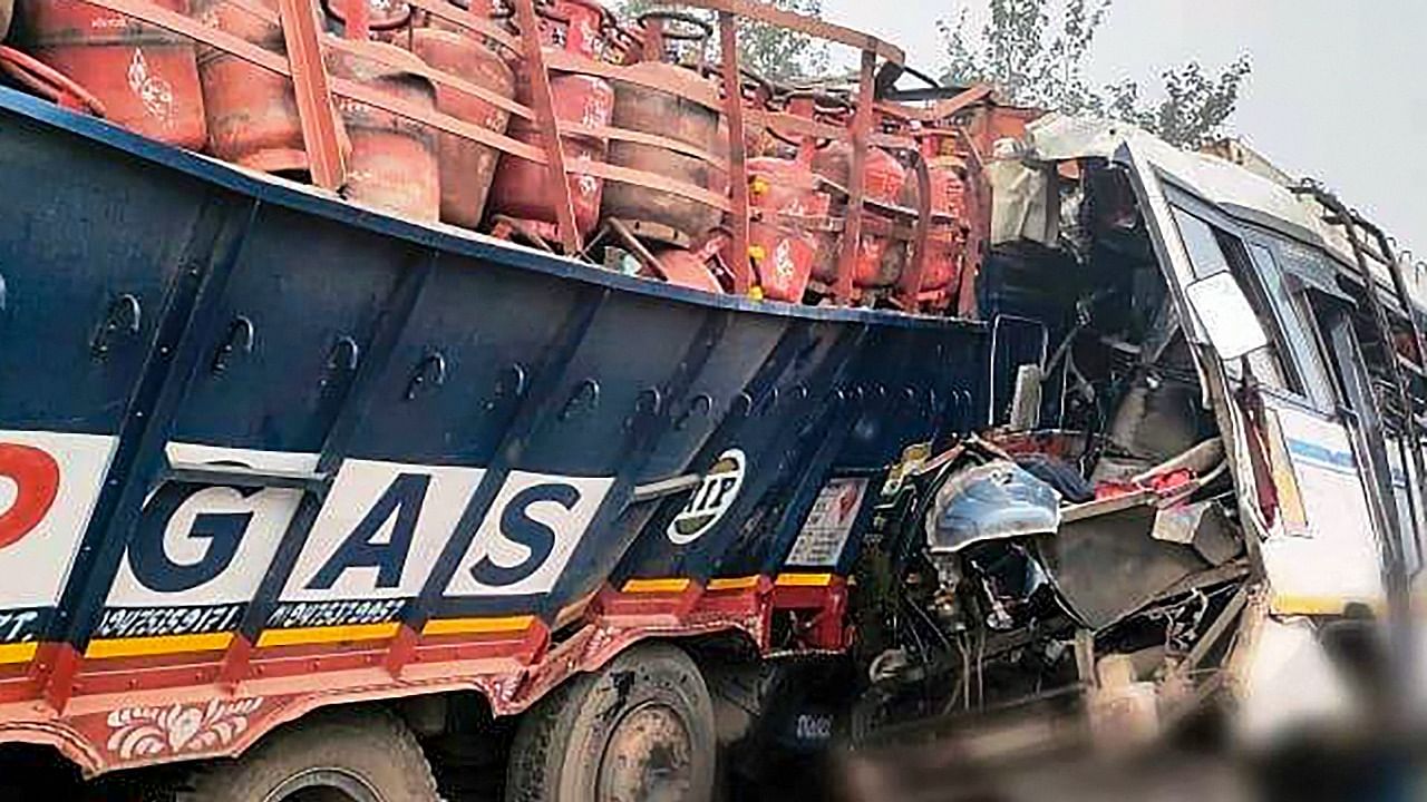 Mangles remains of vehicles after bus collided with a truck at Paderkola village, in Pakur district of Jharkhand. Credit: PTI Photo