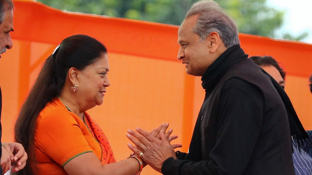 Ashok Gehlot and Vasundhara Raje have been replacing one another as the chief minister every five years. With Gehlot 70 years old and Raje now 68, the Congress and Bharatiya Janata Party have been contemplating a generational change. Credit: PTI File Photo