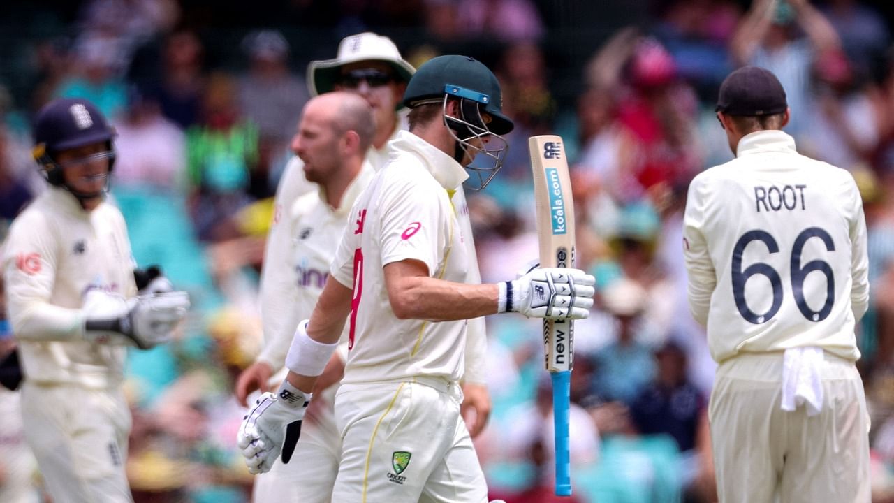 Australia's Steve Smith walks off the field after his dismissal on day four of the fourth Ashes Test. Credit: AFP Photo