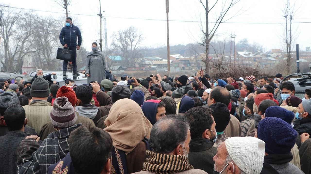 PDP President Mehbooba Mufti surrounded by party supporters from various district in Kashmir shouting slogans while not being allowed by police to move towards the grave of her father and party founder Mufti Mohammed Syed. Credit: IANS