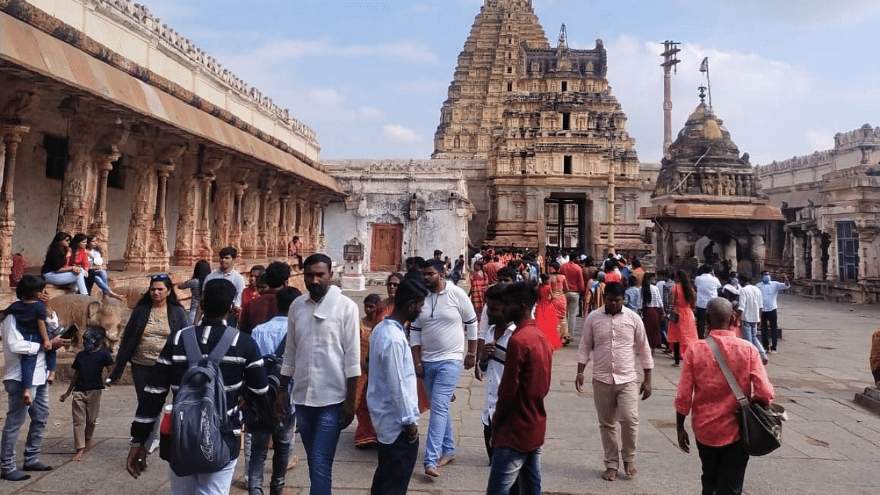 Visitors flock to the Virupaksha Temple in Hampi. Credit: DH Photo