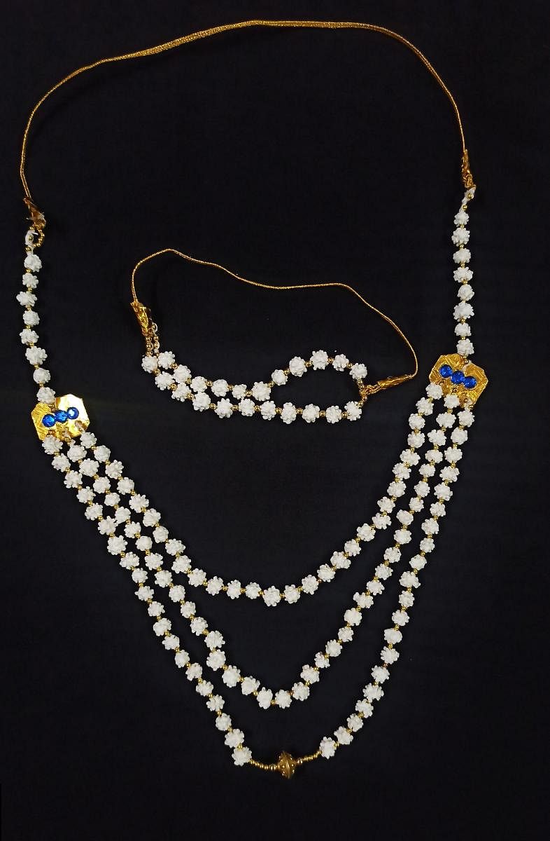 Jewellery made out of kusarellu (a sugar confection). Special Arrangement