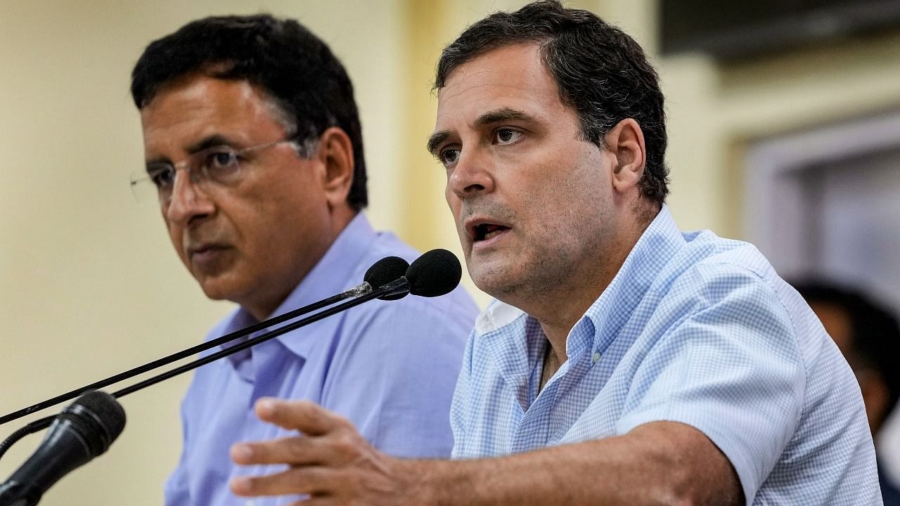 Congress leader Rahul Gandhi and Randeep Surjewala. Credit: PTI File Photo