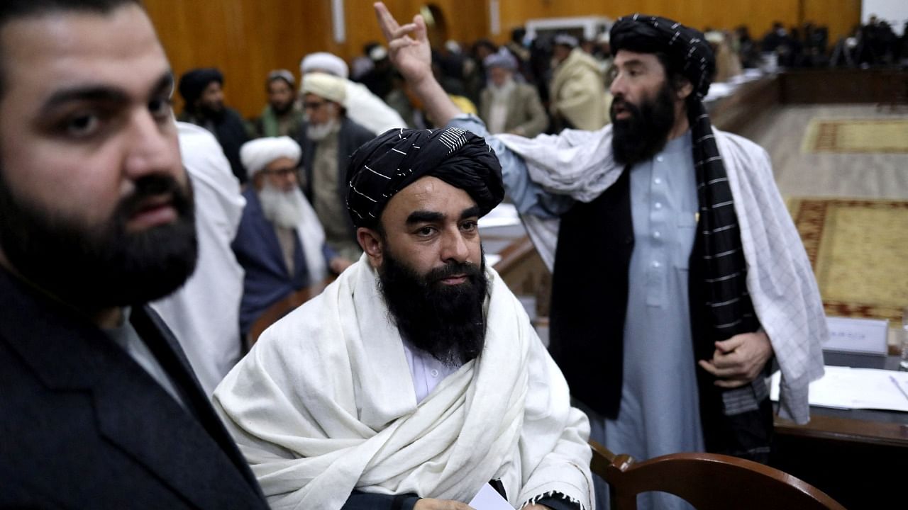 Taliban spokesman Zabihullah Mujahid (C) took to Twitter to announce the detention. Credit: Reuters Photo