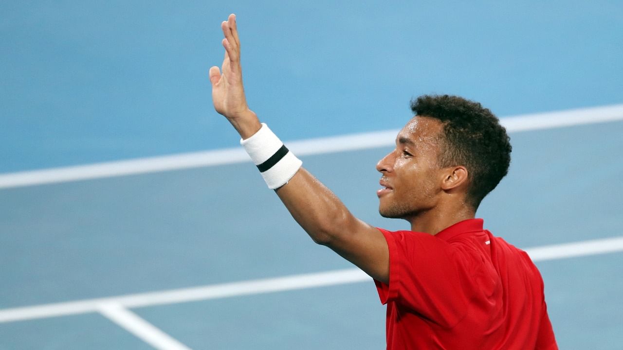 Canada's Felix Auger-Aliassime celebrates after winning the final singles match against Spain's Roberto Bautista Agut. Credit: Reuters Photo