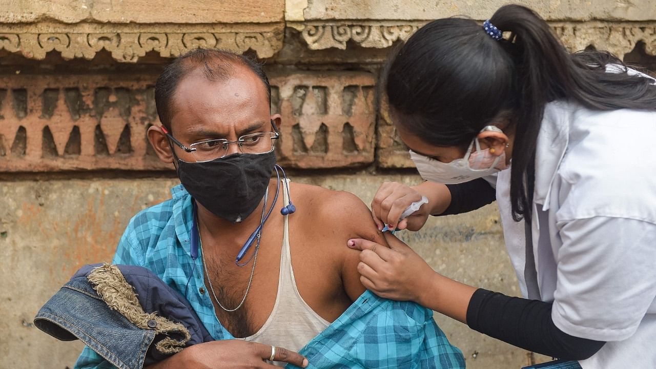 The countrywide Covid-19 vaccination drive was rolled out on January 16 last year with healthcare workers getting inoculated in the first phase. Credit: AFP Photo