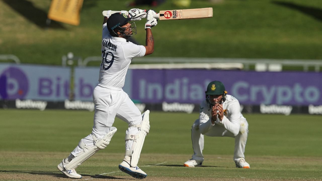 India's Umesh Yadav plays a shot on Day 1 of the 3rd Test against South Africa in Cape Town. Credit: Reuters Photo