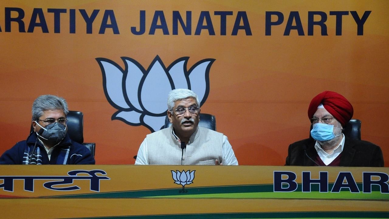 Union Minister Gajendra Singh Shekhawat with Union Minister Hardeep Singh Puri (R) addresses the media at BJP HQ in New Delhi on Tuesday, January 11, 2022. Credit: IANS Photo