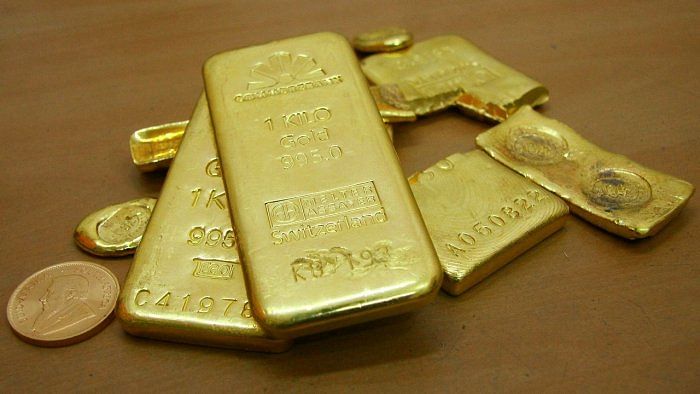 US gold futures were up 0.4 per cent to $1,805.40. Credit: Reuters Photo