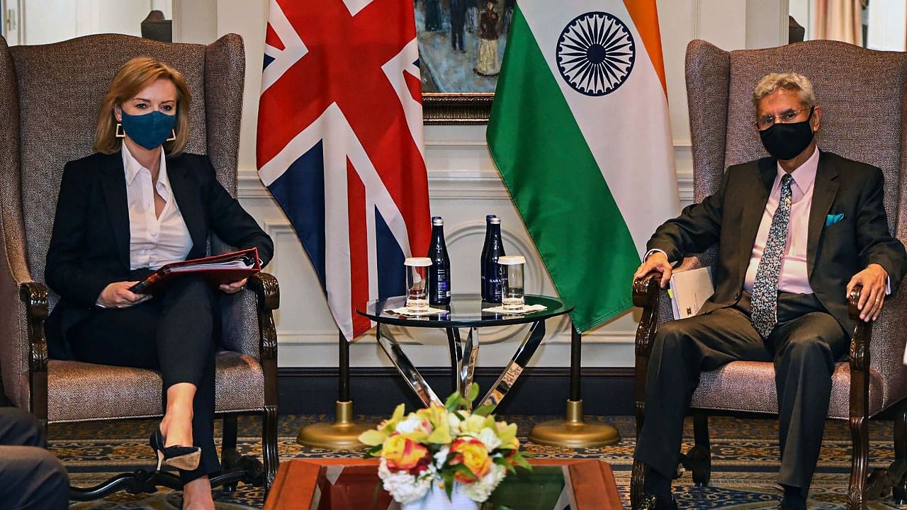 Jaishankar invited Truss (L) to visit India for bilateral talks. Credit: PTI File Photo