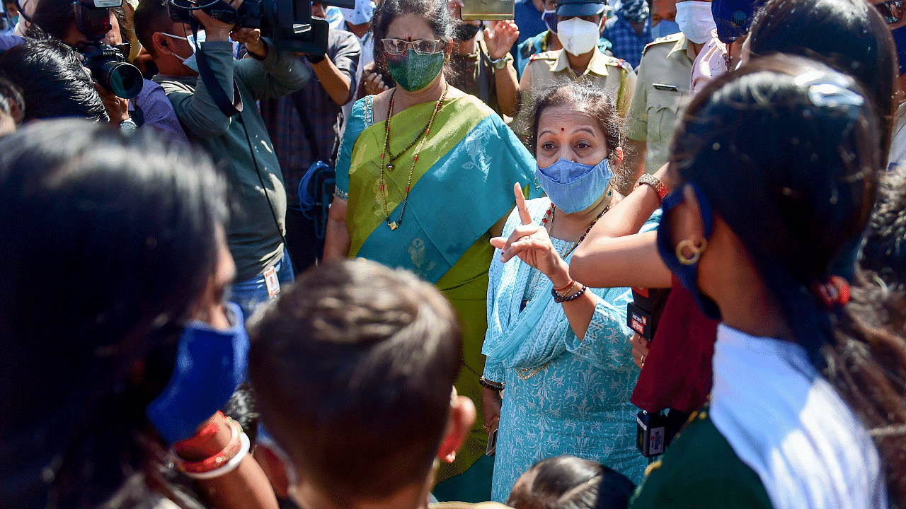 Mumbai Mayor Kishori Pednekar interacts with people to spread awareness on coronavirus during the third wave of Covid-19 in Mumbai. Credit: PTI Photo