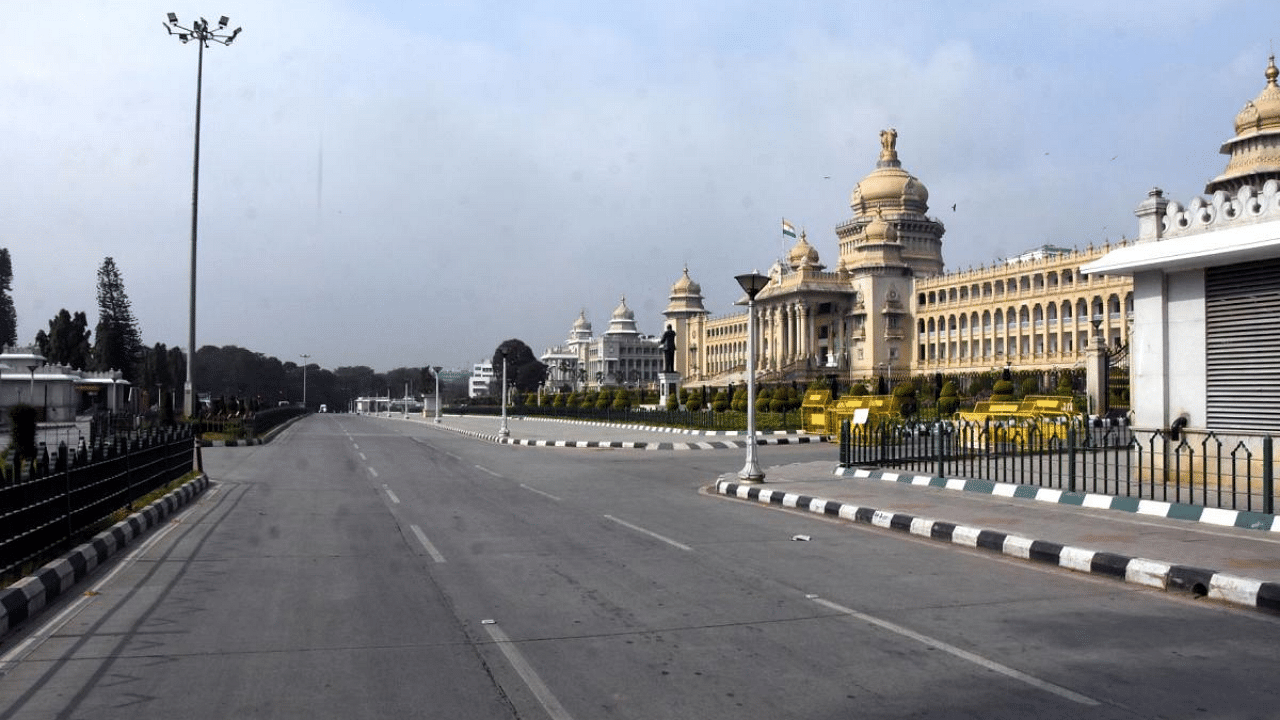 A deserted view of Dr Ambedkar Road during the state-wide weekend curfew in the wake of the coronavirus pandemic. Credit: IANS Photo