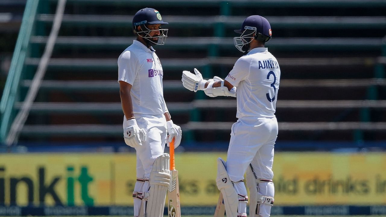 India batters Cheteshwar Pujara (L) and Ajinkya Rahane. Credit: AFP File Photo