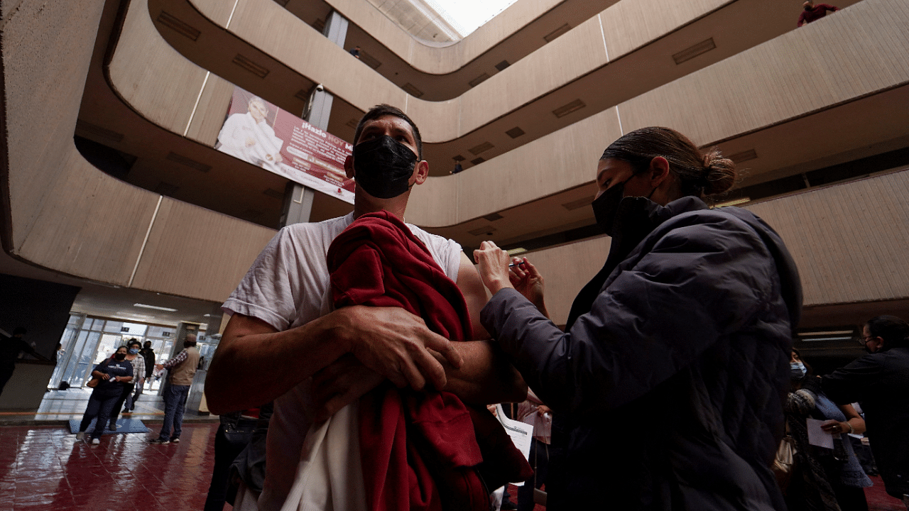 A man receives a dose of the AstraZeneca coronavirus disease (Covid-19) vaccine. Credit: Reuters Photo