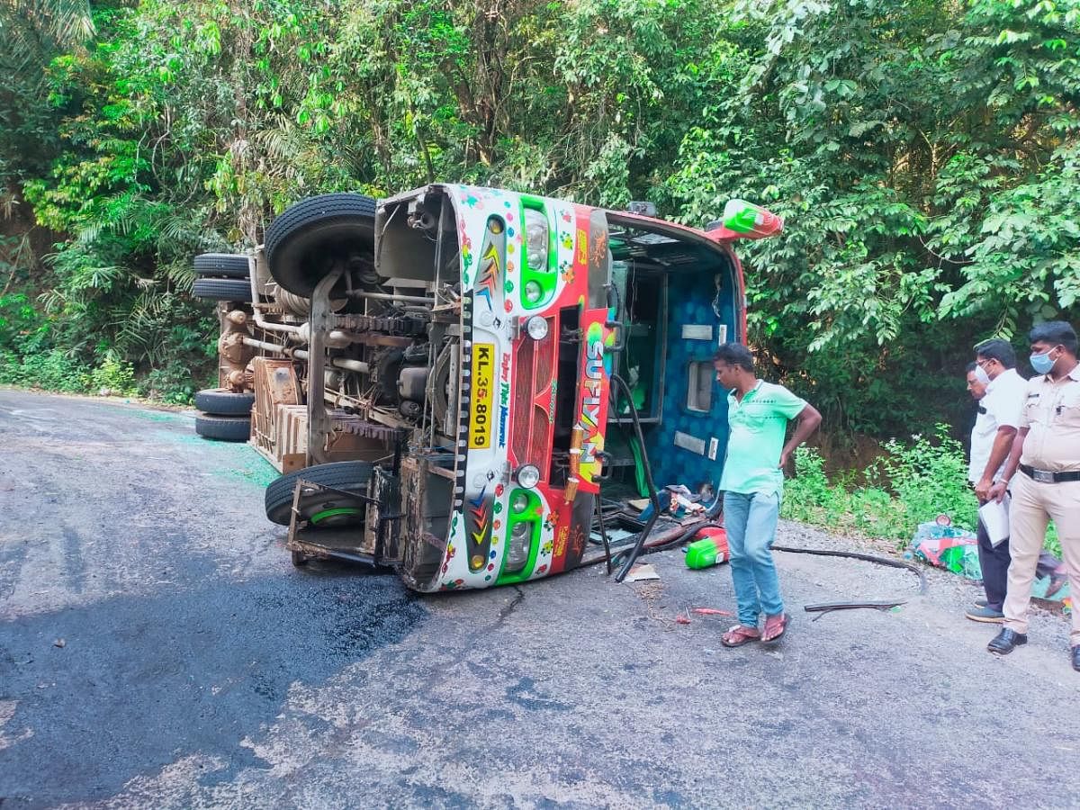 A private bus overturned at the Onkalmori curve in Kundapura near Kollur.