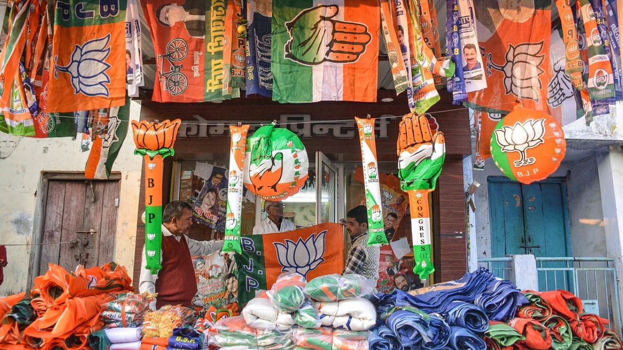 Election campaign material displayed for sale, ahead of the UP Assembly polls, near Bramha Nagar, in Kanpur. Credit: PTI Photos